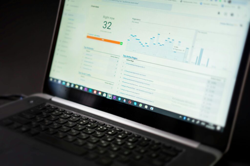 pexels photo 12969403 12969403 A laptop displaying an analytics dashboard with real-time data tracking and analysis tools.